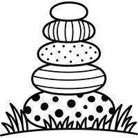 Tumpukan Batu Berpola di Rumput